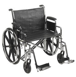 McKesson Heavy-Duty Wheelchair with Padded, Removable Arm, Composite Mag Wheel, 24 in. Seat, Swing-Away Footrest, 450 lbs